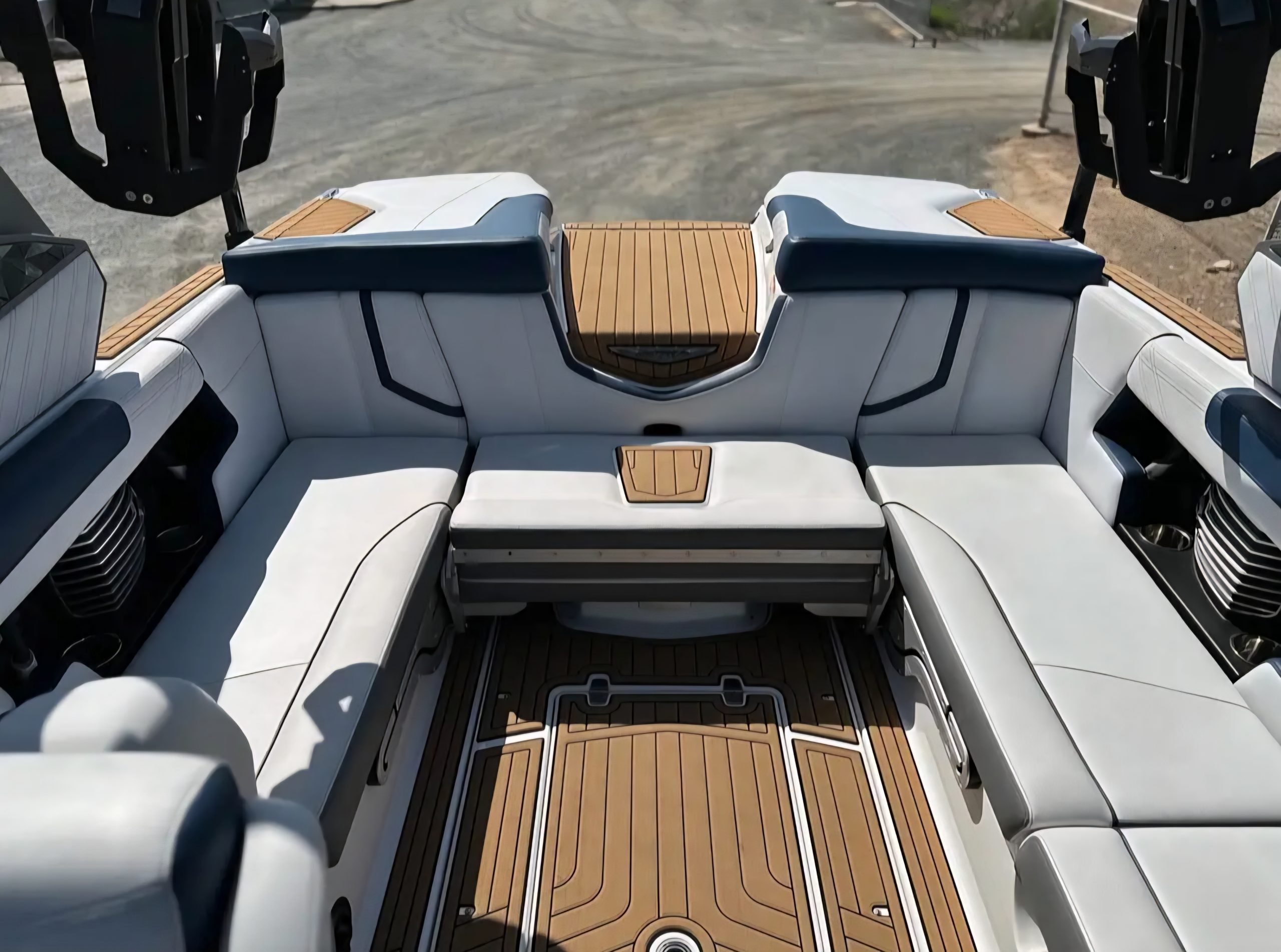 Rear seating area of Super Air Nautique G23 with lounging seats and padded transom access